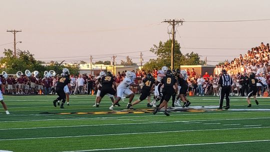 ’Jackets roll past Bearcats in Battle of the Ax