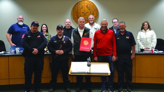 Sen. Springer honors WFD volunteers with signed proclamation