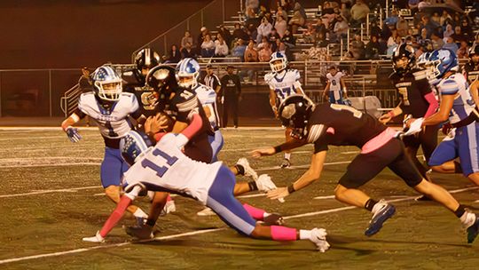 Tigers rip Rebels, 41-7