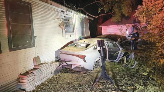 Vehicle crashes into house