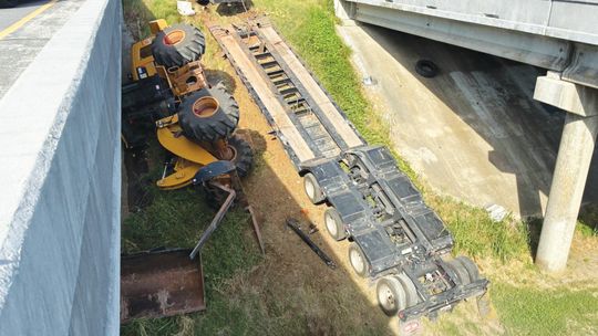 WFD tackles tipped trailer...