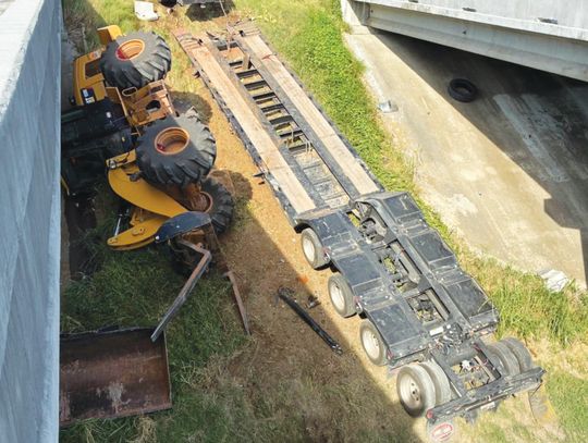 WFD tackles tipped trailer...