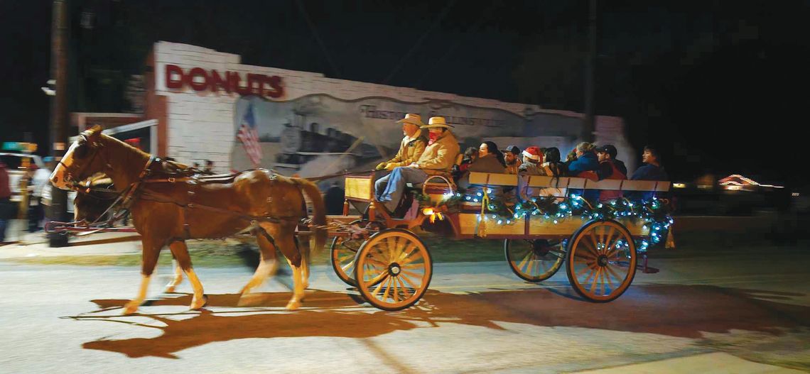 Horse-drawn wagon rides were a new addition to this year’s Collinsville Christmas On the Square event.