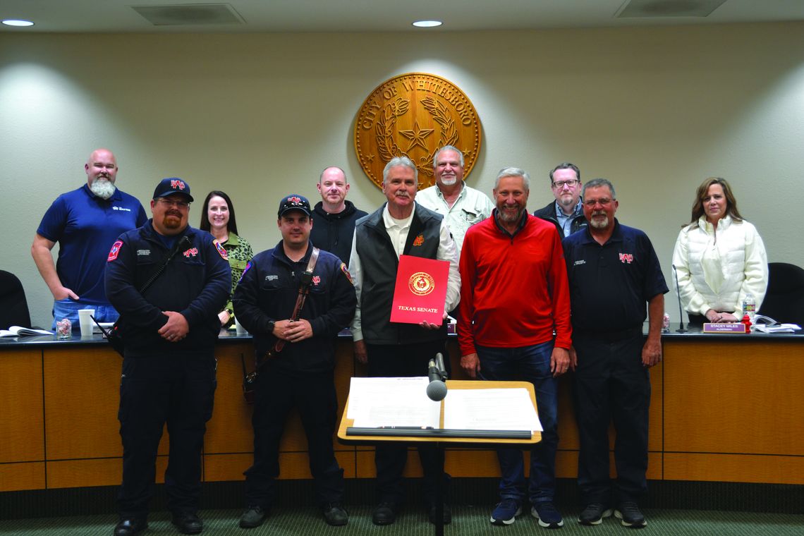 Sen. Springer honors WFD volunteers with signed proclamation