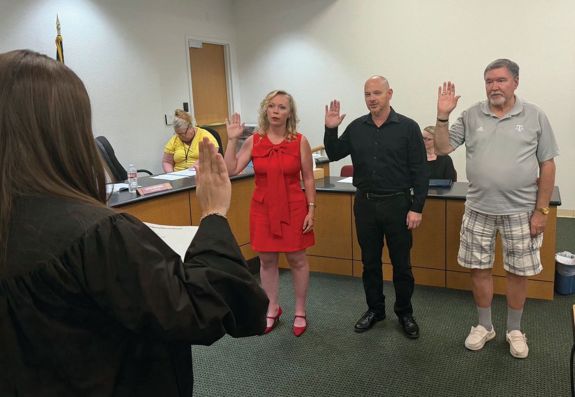 Sworn into office... Sworn into office...